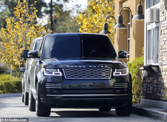 Taking control: Jennifer was seen driving Ben's Range Rover to the location