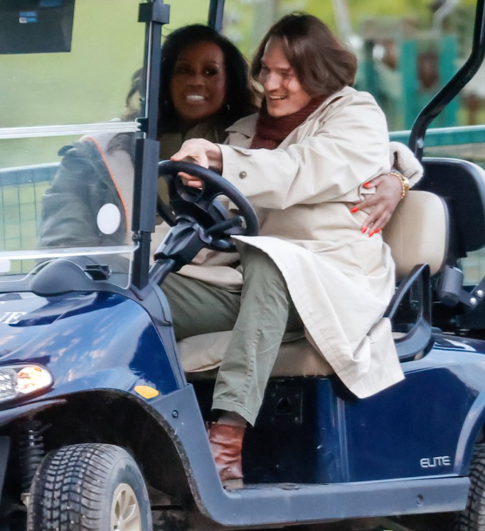 At one point they jumped into a golf buggy, with Alison putting an arm around David while he drove