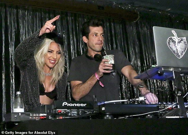 Taking to the decks: Gaga was letting loose alongside the British musician as he took to the DJ decks to entertain revelers 