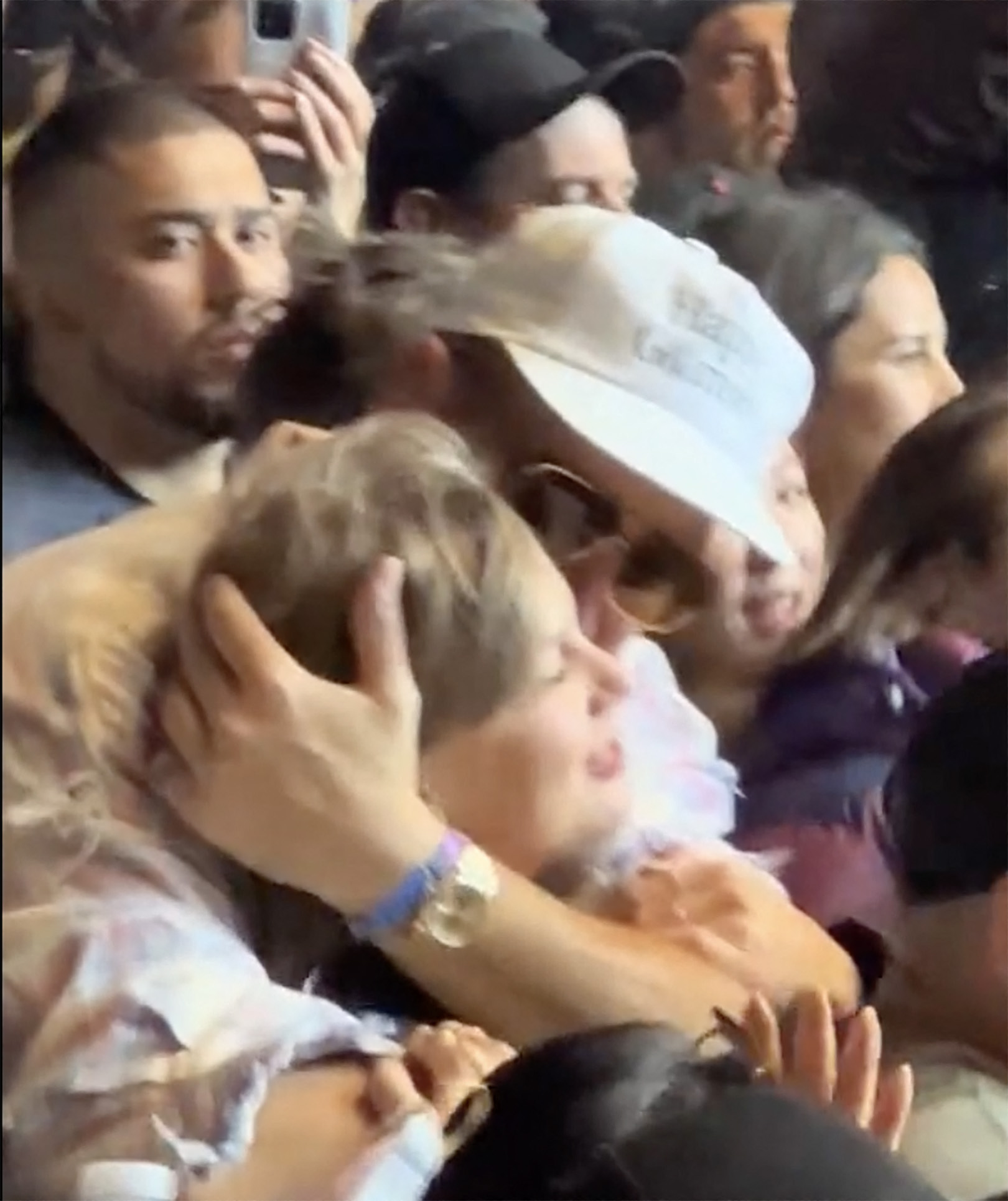 Taylor Swift and Travis Kelce hugging at Coachella.