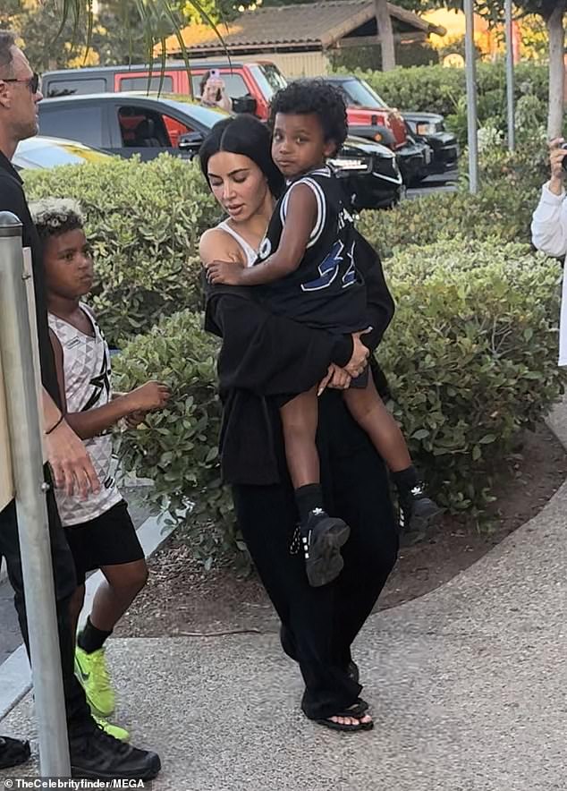 Kim and her boys ¿ both of whom she shares with ex-husband Kanye West ¿ were joined by a hefty security team