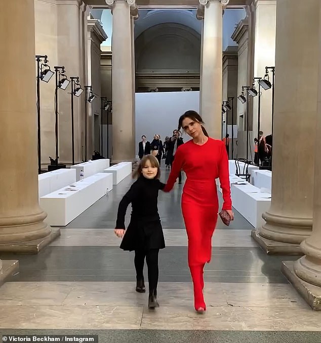 One old snap showed Victoria and Harper at one of her early fashion shows as they wore red and black outfits