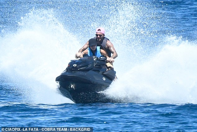 Victoria didn't let her husband have all the fun as she later jumped onto the jet ski and took her husband for a spin