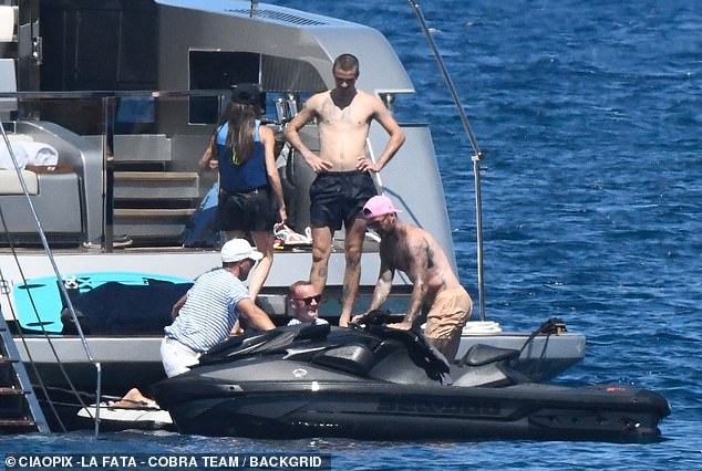 The Beckham boys were keen to make the most of their time on holiday