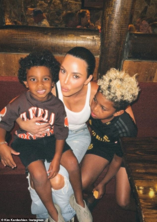 The entrepreneur was seen posing with her two sons in one photo, wrapping her arms around her eldest son Saint as well as her youngest Psalm, who was sitting on her lap