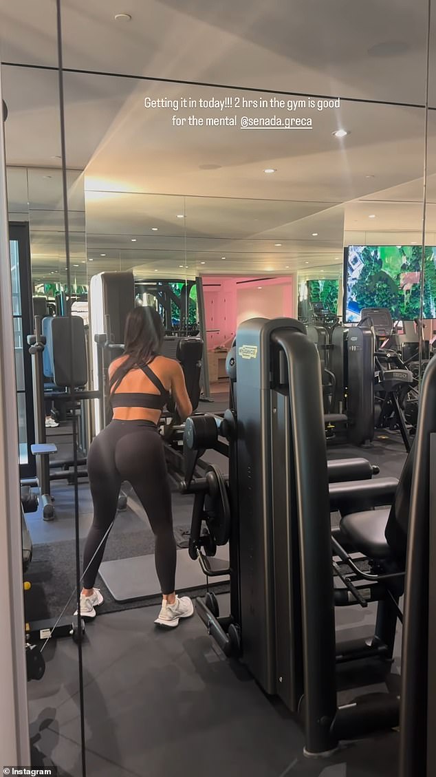 The mother of four captioned the video shared to her Instagram page 'Getting it in today!!! 2 hrs in the gym is good for the mental,' tagging her trainer Senada Greca