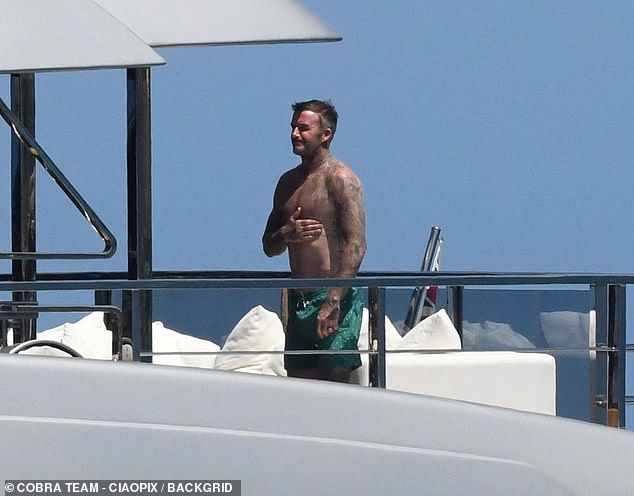 David showed off his tattooed physique as he enjoyed the Sardinia sunshine