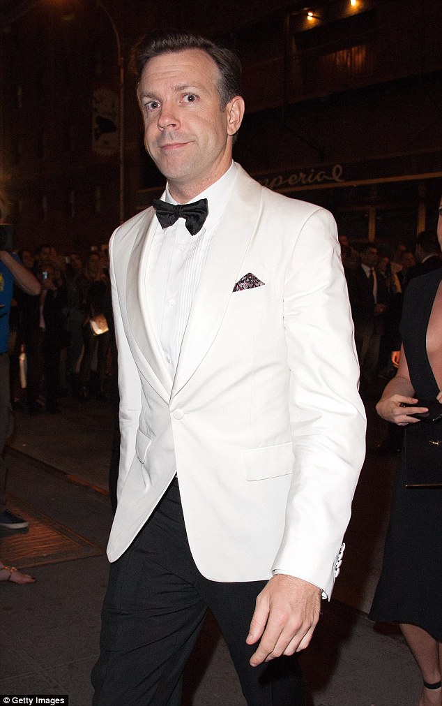 Dapper gent: Her husband Jason Sudeikis looked dapper as he followed into the bash