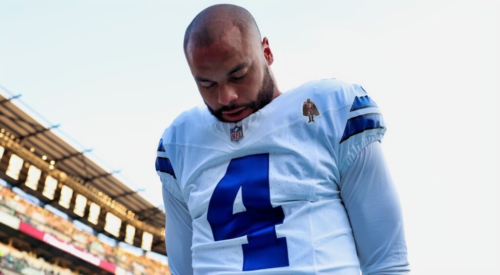 Dak Prescott stands during the anthem.