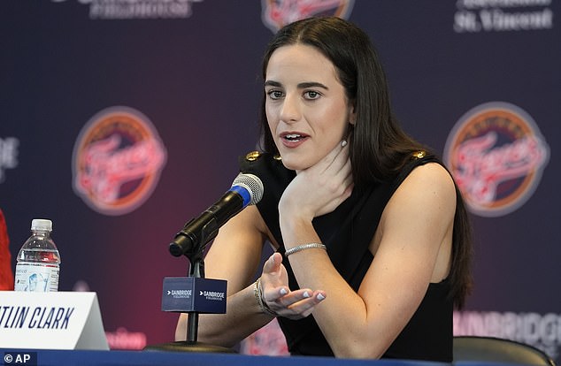 Caitlin Clark looked shocked at the exchange with a reporter during her first presser in Indiana on Wednesday. During the presser, Gregg Doyel of Indy Star Sports imitated Clark's heart-hands gesture before saying: 'Start doing it to me and we'll get along just fine'