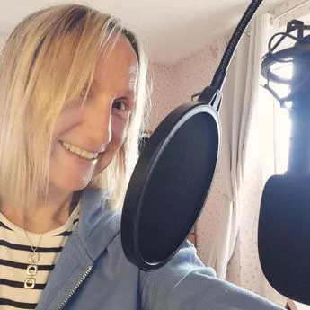 Carol McGiffin with a mic