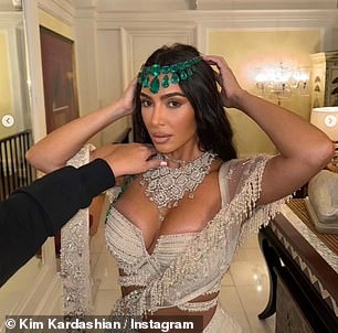 In one snap, Kim glammed up the luxurious look with an eye-catching necklace that contained 170 carats of diamonds, per Page Six