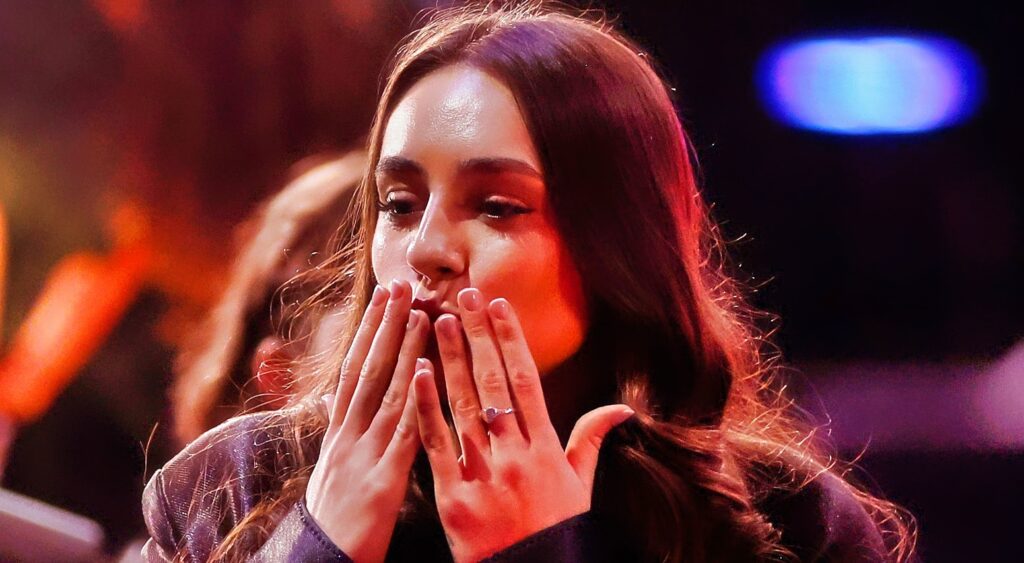 Nika Muhl blows kisses at the WNBA Draft.