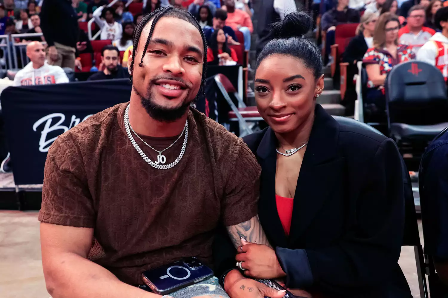 Simone Biles and Jonathan Owens attend a game between the Houston Rockets and the Los Angeles Lakers at Toyota Center on January 29, 2024