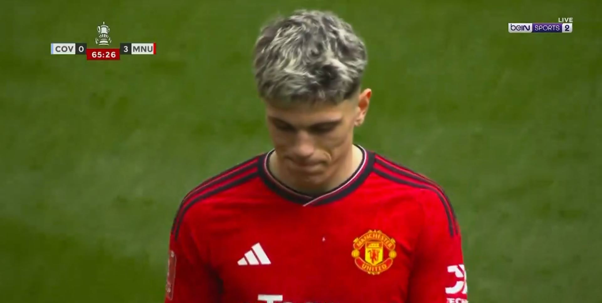 Alejandro Garnacho cuts a frustrated figure as he leaves the Wembley pitch